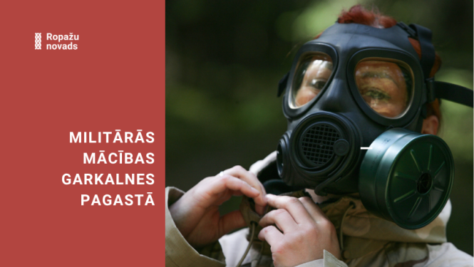 Garkalnes pagastā notiks militārās mācības, bildē: sieviete ar gāzmasku