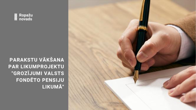 parakstu vākšana, bildē vīrietis tur rokās pildspalvu